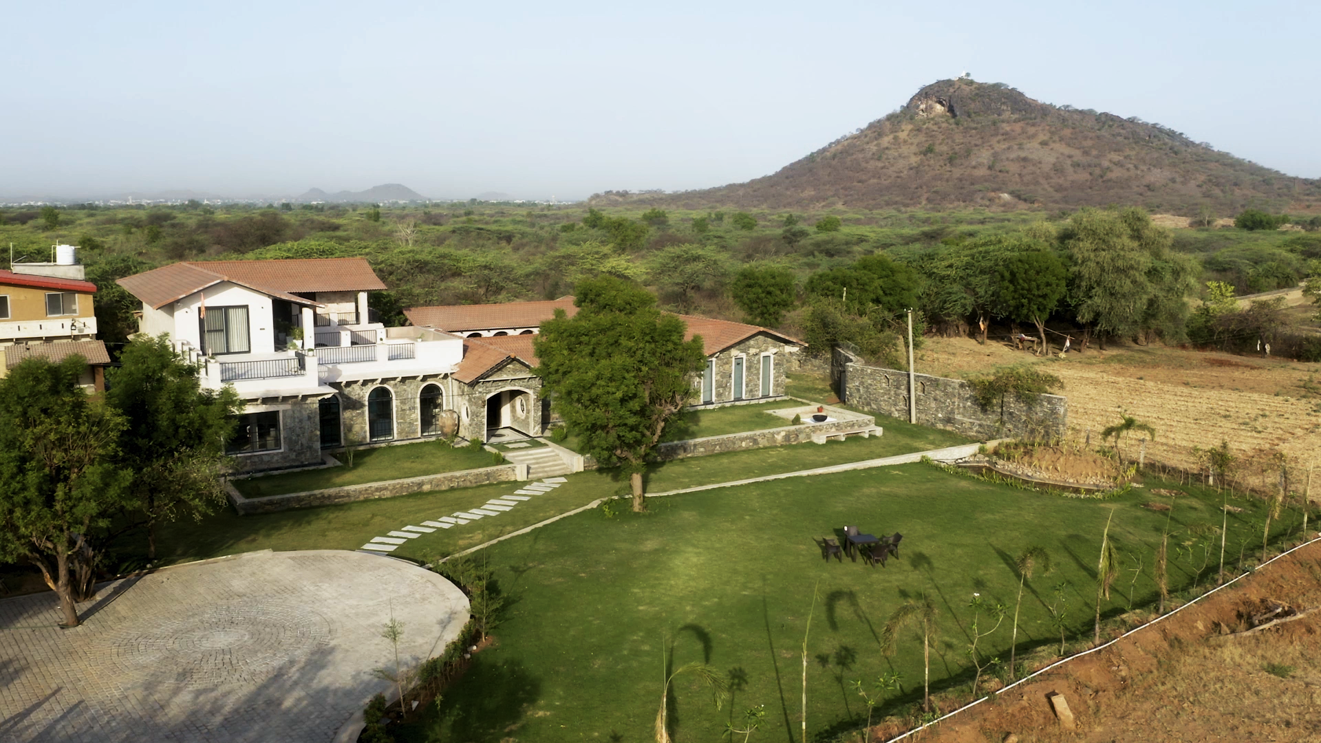 Poetry Slam: A 15,000 sq. ft. Rajasthan Home Recites Verses on Sustainability Tucked in its Stone Walls
